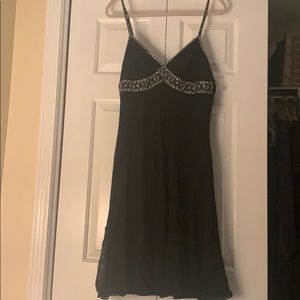 Elegant pleated black cocktail dress